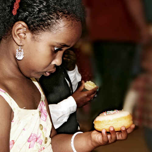 Girl Surprised by Doughnut